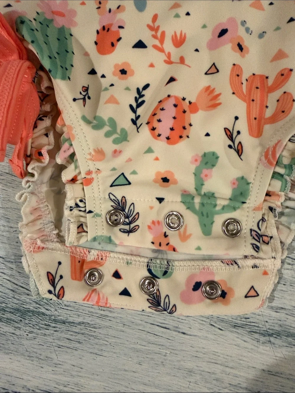 Ruffle Butts Cream Cactus-Print Long-Sleeve One-Piece with Coral Trim size 0-3mo